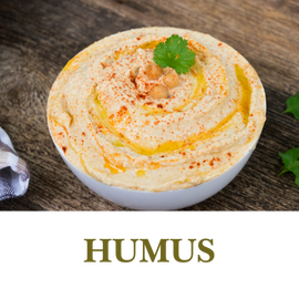 Hummus is a smooth, creamy spread made from blended chickpeas, tahini, and olive oil, with a hint of lemon and garlic.