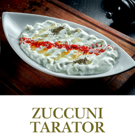 Zucchini Tarator is a refreshing yogurt-based meze with grated zucchini, garlic, and a touch of olive oil.