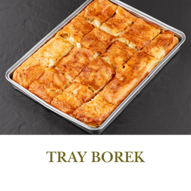 Tray Borek is a large, layered pastry filled with cheese or meat, baked and served in slices.